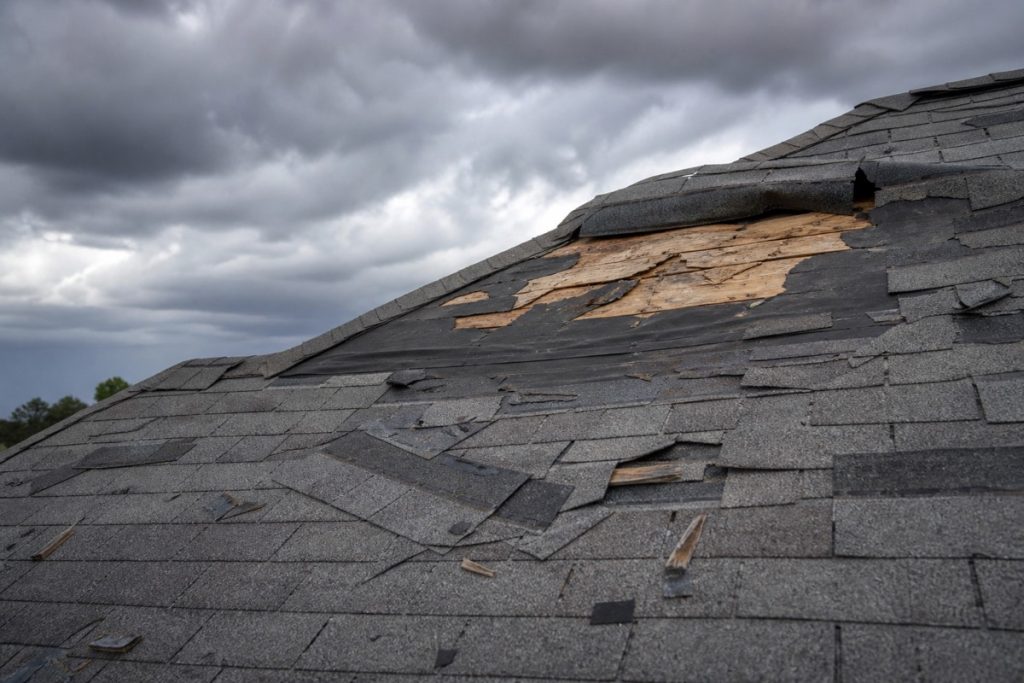 Does insurance cover roof replacement: wind damage with missing shingles after a storm